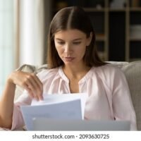 focused-student-girl-receiving-letter-260nw-2093630725