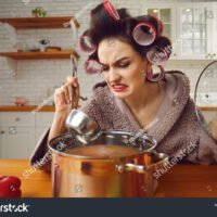 stock-photo-kitchen-calamity-bad-unskilled-novice-housewife-cooking-food-for-the-first-time-funny-woman-in-1917209768
